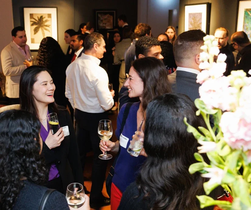 Alumni mingling during a networking reception