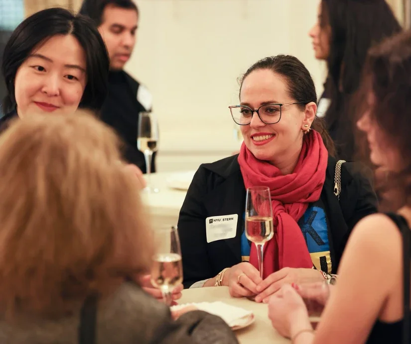 Alumni mingling during a networking reception
