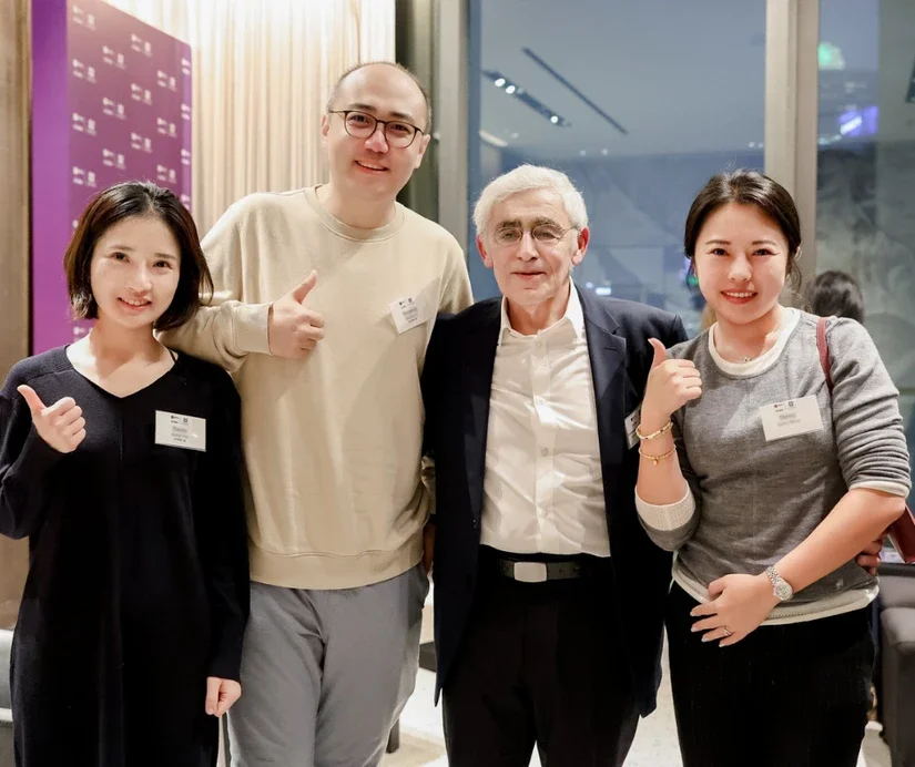 Professors mingled during the reception