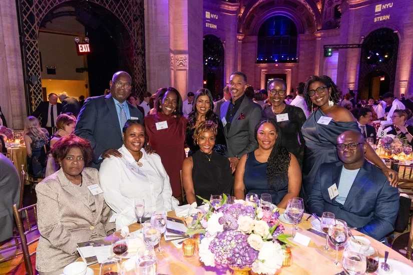Chavon Sutton (center), recipient of the of NYU Stern Torchbearer Award, at the Haskins Giving Society Awards Dinner with her family