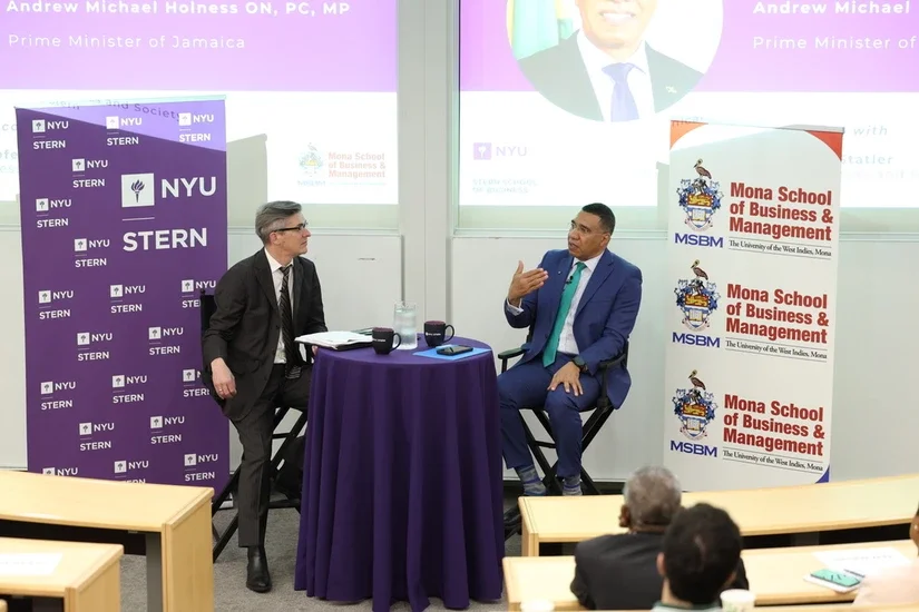 Dr. The Most Honorable Andrew Michael Holness ON, PC, MP, Prime Minister of Jamaica (right), speaking with NYU Stern Professor Matt Statler (left)