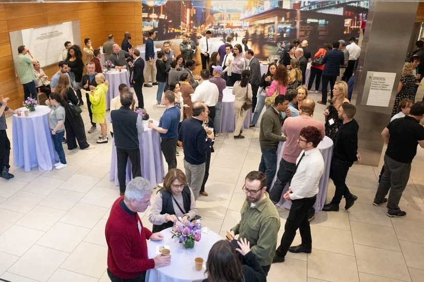 Alumni mingled during a networking reception after the workshop.