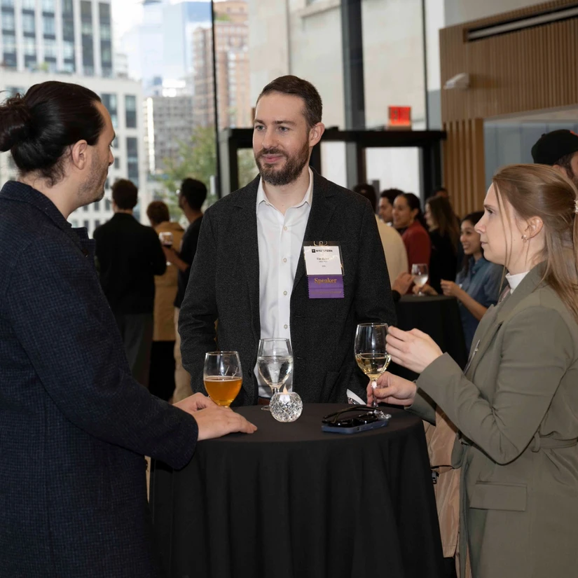 Alumni mingled after the discussion