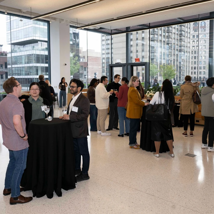 Alumni mingled during a networking reception after the workshop.