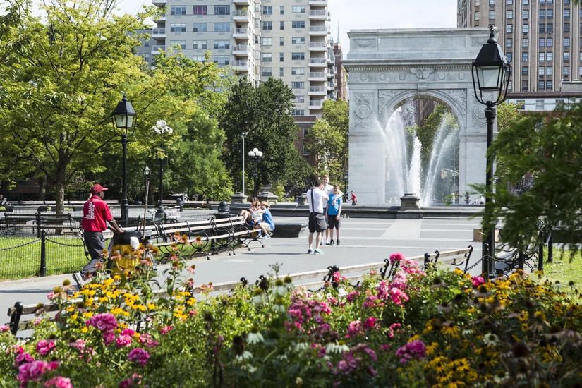 People in Washington Square Park in the Spring in front of the Arch