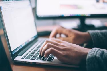 Laptop and hands