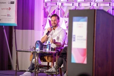 Ryan Piela (MBA ’18) speaks at a BeautyConnect conference in Los Angeles