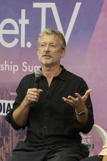 Justin Evans speaking at Advertising Week 2025 in New York City