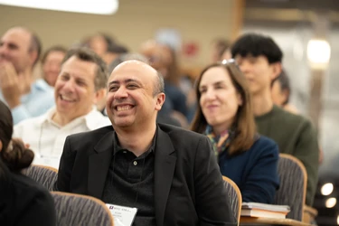 An alumnus smiles during a Lifelong Learning event