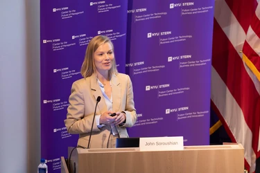 simon speaking at podium