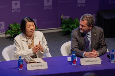 eddinger and saliman sitting on the panel
