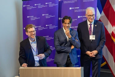 cohosts smiling at the close of conference