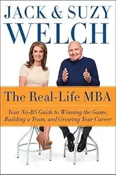 A cover of "The Real-Life MBA" which includes a photo of Jack and Suzy Welch and says: "Jack & Suzy Welch. The Real-life MBA. Your No-BS Guide to Winning the Game, Building a Team, and Growing Your Career."